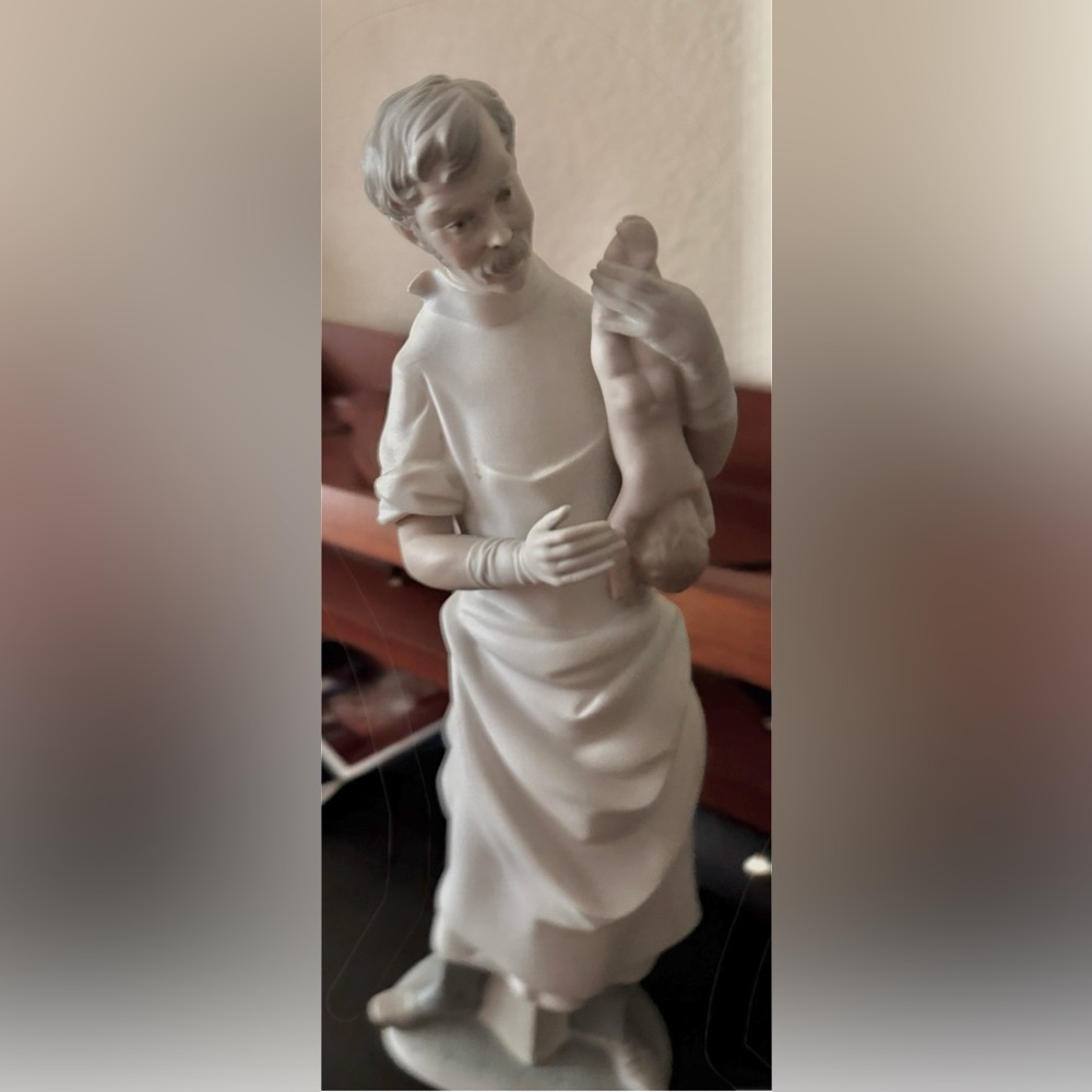 Lladro Retired “Obstetrician” - Elegant White Porcelain Sculpture